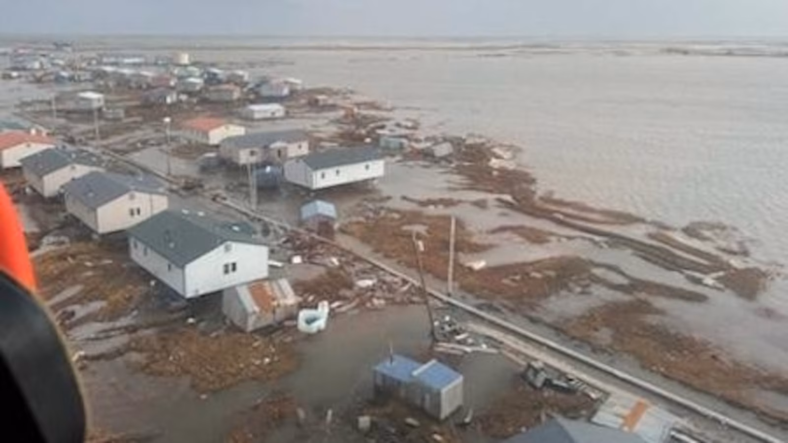Officials airlift evacuees to safety after the remnants of Typhoon Halong devastate Alaska villages